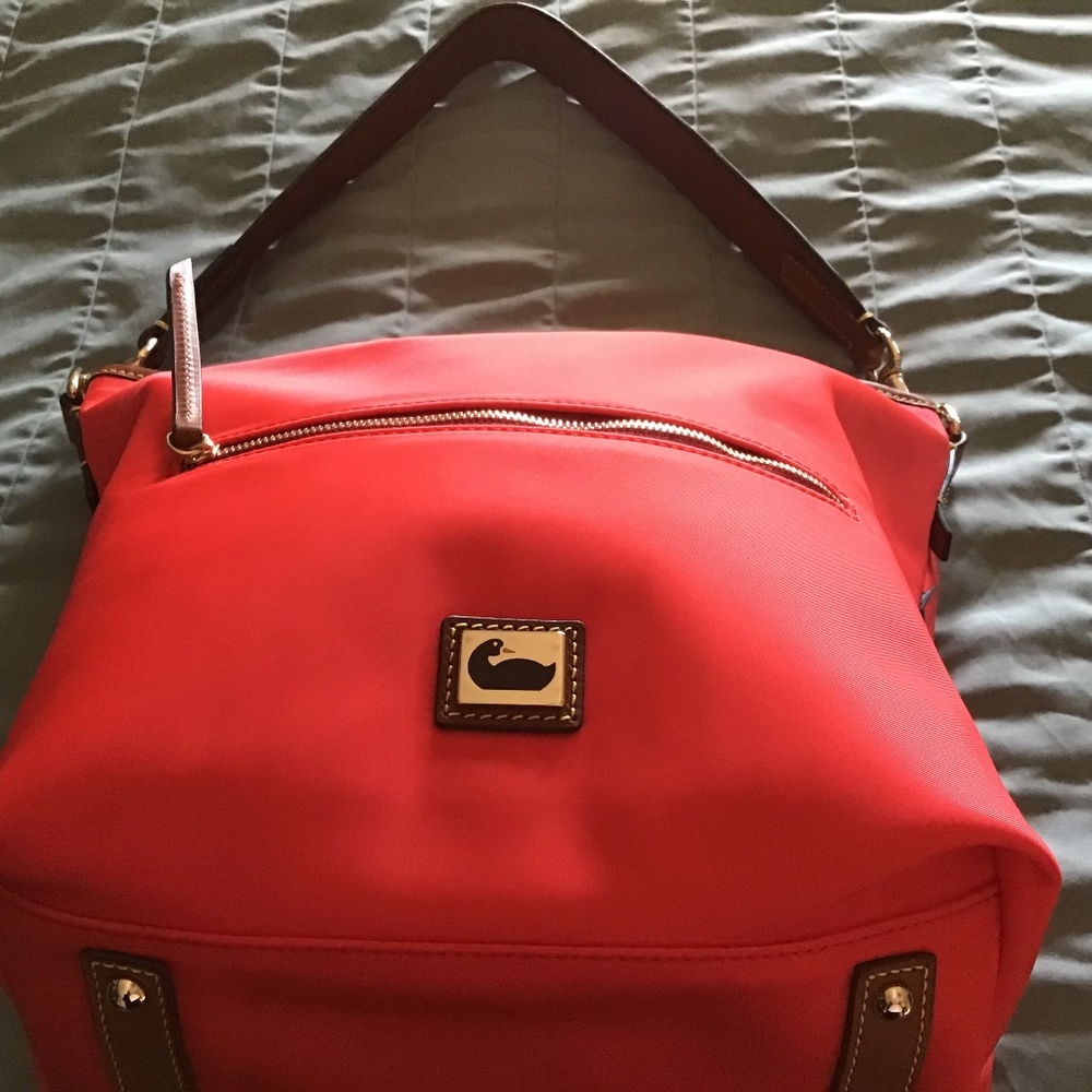 Gorgeous blood orange Dooney & Bourke
